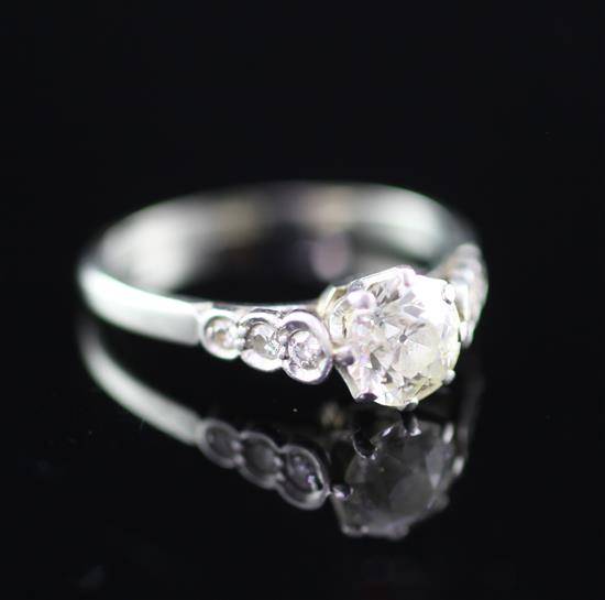 A platinum set diamond solitaire ring, size M.